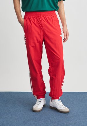 FIREBIRD - Tracksuit bottoms - better scarlet