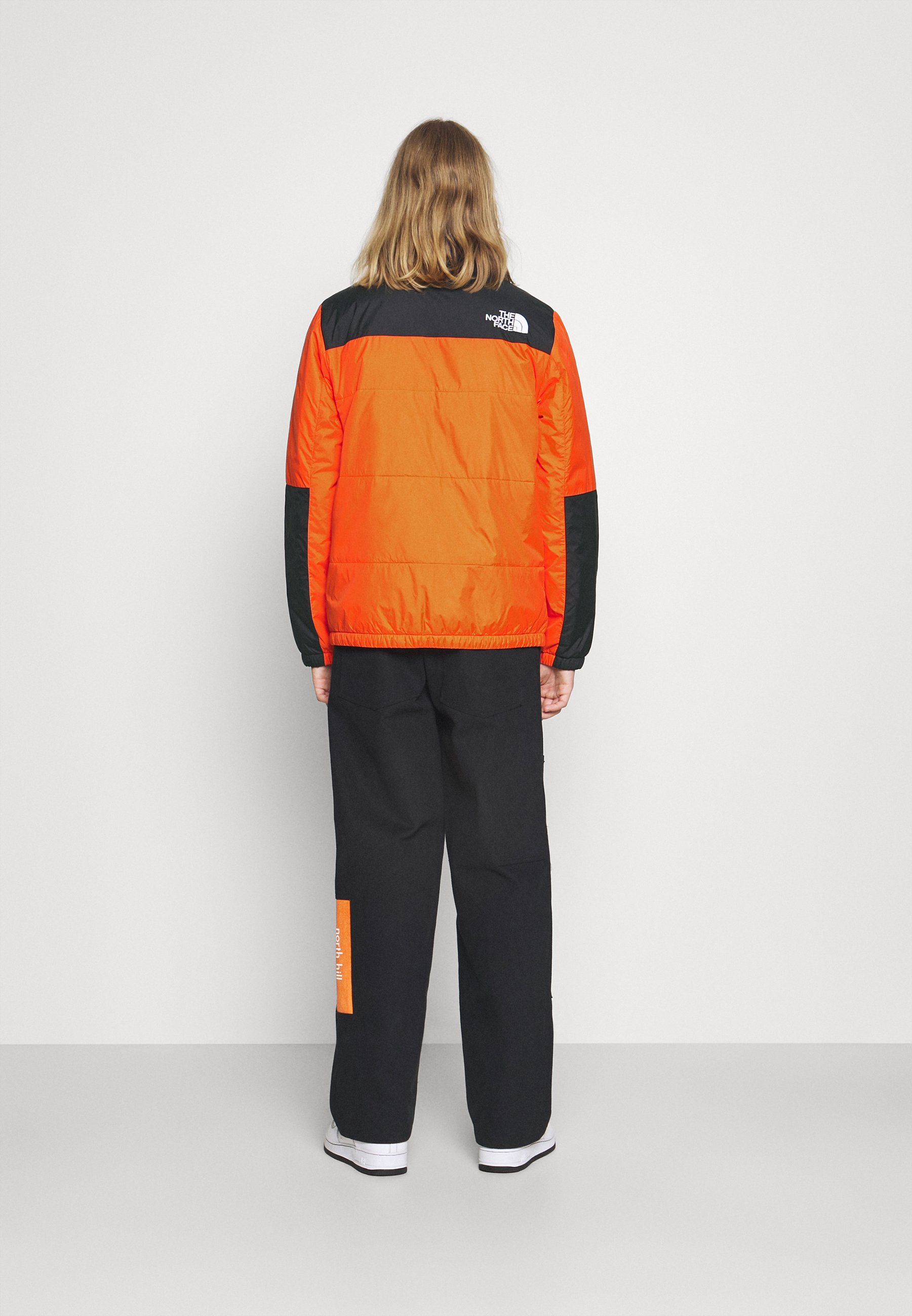 orange red puffer jacket