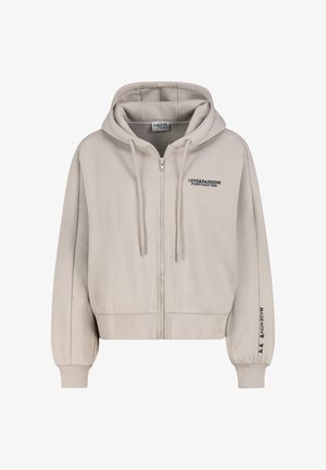 Beige zip-up hoodie met trekkoorden, voorkant tekst "LOVE&PASSION STUDIO COLLECTION" en mouwtekst "MADE WITH" gevolgd door drie harten.