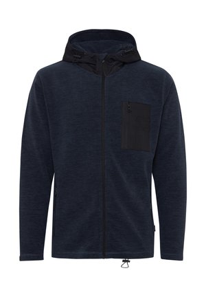 Námořnická zipová mikina vyrobená z měkké látky, s černou kapsou na prsou, nastavitelnou kapucí a elastickými manžetami se stahovací šňůrkou na spodním lemu.