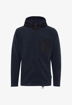 Námořnická zipová mikina vyrobená z měkké látky, s černou kapsou na prsou, nastavitelnou kapucí a elastickými manžetami se stahovací šňůrkou na spodním lemu.