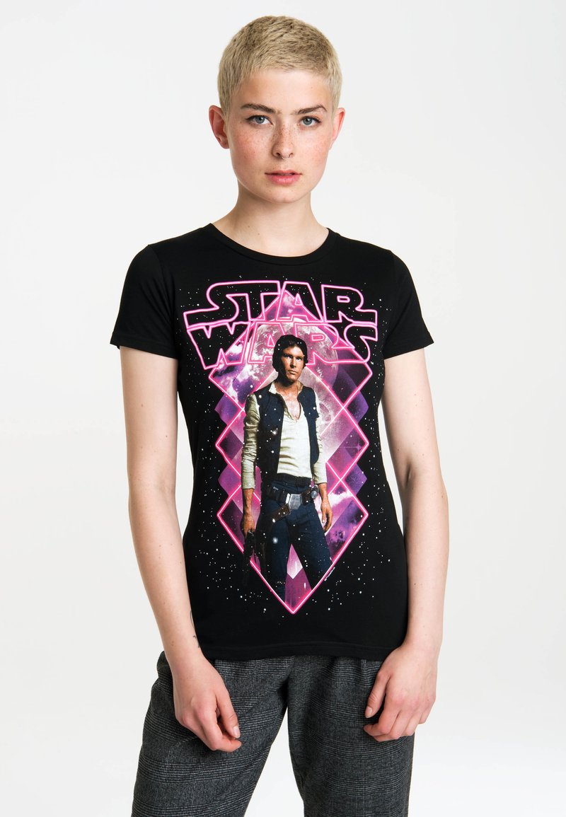 Black t-shirt featuring a stylized graphic of Han Solo from Star Wars, highlighted with pink and purple accents against a starry background.