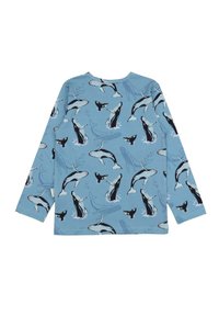 Langarmhemd in Hellblau, mit einem Muster von Walen und Delfinen in verschiedenen Posen sowie Schattierungen von Schwarz und Weiß. Aus weichem Baumwollmaterial.