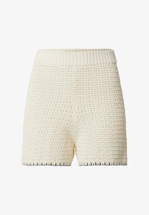 Cremfarbene Häkelshorts mit einem gerippten elastischen Taillenbund, die mit strukturierten Mustern und einem gewellten Saum verziert sind.