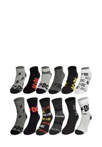 Set di 12 paia di calzini alla caviglia in nero, grigio e bianco, con vari motivi, loghi e accenti colorati, realizzati in un tessuto morbido.
