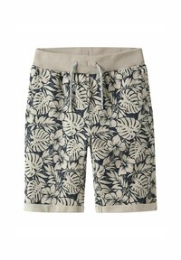 Shorts de bain floraux avec une taille élastique beige, présentant un motif tropical bleu marine de feuilles et de fleurs, fabriqués en tissu léger.