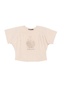 Beige cotton t-shirt with wide short sleeves, gathered pleats on the front, and a graphic print of a pineapple with text underneath.