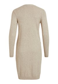 Abito lavorato a maglia beige con maniche lunghe, scollatura rotonda e dettagli a coste ai polsini e all'orlo. Tessuto morbido e testurizzato con una finitura liscia.