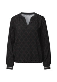 Blouse noire avec un col en V et des poignets élastiques, présentant un motif géométrique marron sur l'ensemble. A une coupe décontractée et des détails en bord côtes.