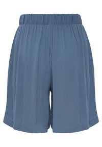 Niebieskie, tkane szorty z elastycznym pasem, luźnym krojem i bocznymi kieszeniami. Materiał ma fakturowane wykończenie i sięga powyżej kolana.