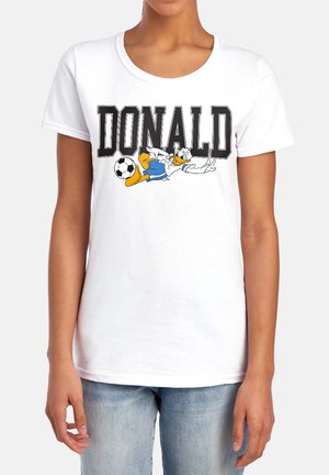 White t-shirt with "DONALD" text and cartoon duck kicking a soccer ball, worn by a person in blue jeans.