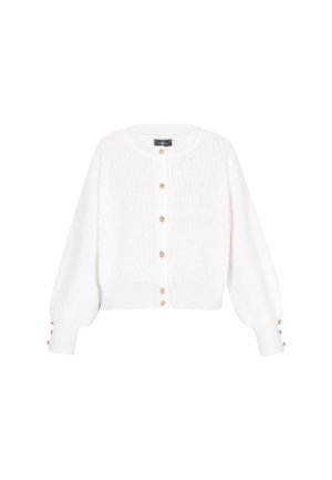 Balts adīts džemperis ar zelta pogām priekšpusē un uz aprocēm, ar garām piedurknēm un apaļu kakla izgriezumu.