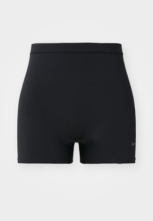 Melni sporta šorti, kas izgatavoti no gludas, elastīgas materiāla, ar vidēja augstuma jostasvietu un mazu Nike logotipu kreisajā pusē.