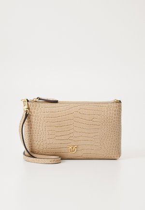 Beige crocodile-embossed leather clutch with a detachable strap, gold hardware, and a raised logo at the front. Zippered top closure.