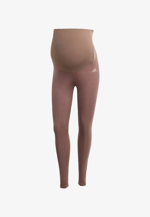 Legginsy ciążowe z miękkiego, elastycznego materiału. Jasnobrązowy kolor z wysokim stanem. Posiadają subtelną grafikę po boku.