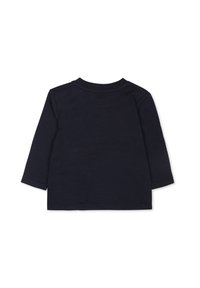 Lange mouwen shirt in marineblauwe katoen met een ronde hals. Zachte textuur, eenvoudig ontwerp en geen zichtbare patronen of versieringen.