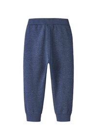 Pantalones jogger azul marino hechos de un suave tejido texturizado, con una cinturilla ajustada y puños en los tobillos. Diseño sencillo y casual, sin patrones ni acentos.