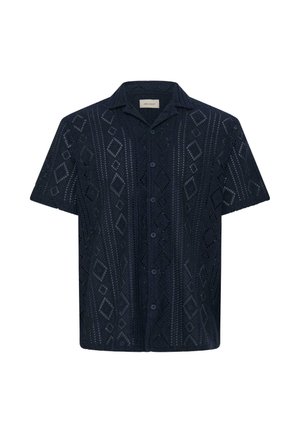 Mørk marineblå kortærmet skjorte med knapper foran, åben strikket diamant- og stribemønster samt en camp-krave.