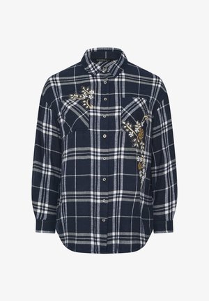 Navy blue plaid flannel shirt with white lines, featuring floral embroidery on the left chest and two front pockets. Button-up design.