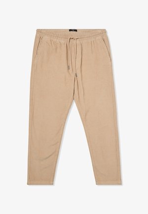 Pantaloni in corduroy beige con vita elastica, coulisse regolabile, tasche laterali e design a gamba affusolata. Tessuto testurizzato.