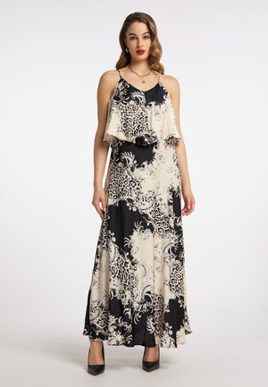 Maxikjole med en struktureret flounce-overdel. Har et sort og creme mønster med blomster- og dyremotiver, lavet af et glat stof.