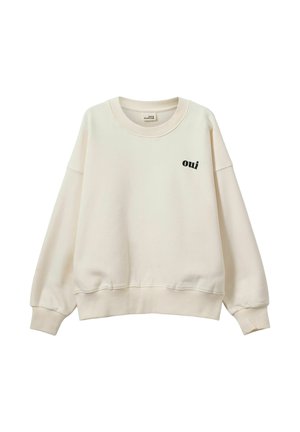 Cremet sweatshirt lavet af blødt stof. Har rund hals, ribbet ærmekanter og kant, med "oui" broderet i sort på forsiden.
