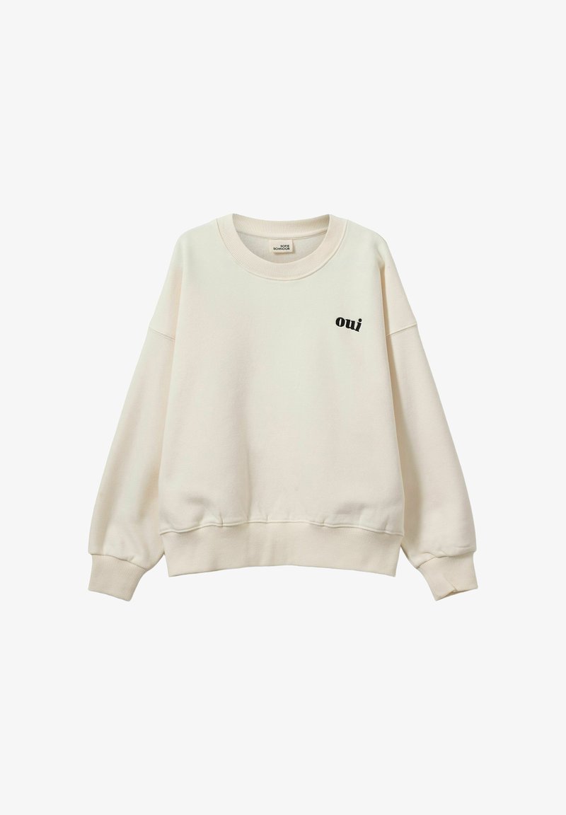 Sudadera color crema hecha de tela suave. Cuenta con cuello redondo, puños y dobladillo acanalados, con "oui" bordado en negro en el frente.