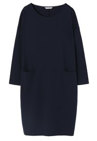 Mörkblå knälång klänning med lång ärm, rund halsringning och lös passform. Har två framfickor och en mjuk, slät textur.