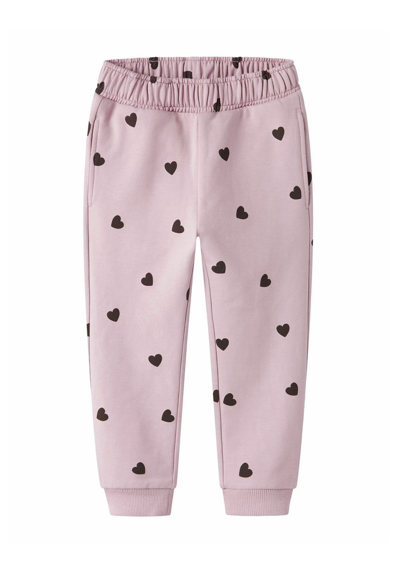 Pantalones de chándal rosa claro con patrones de corazones negros, con una cintura elástica y dobladillos ajustados. Textura suave y lisa, estilo casual.