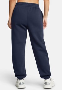 Under Armour Träningsbyxor - blue