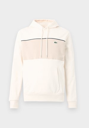 Odtón bílá mikina s kapucí s světle béžovým panelem na hrudi, černou lemovací linkou, zeleným krokodýlím logem, stahovacími šňůrkami, dlouhými rukávy a přední kapsou typu klokan.