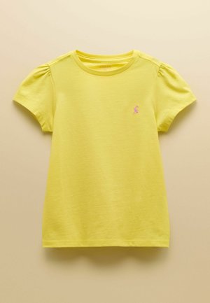 Gelbes Kinder-T-Shirt mit kurzen Ärmeln, rundem Ausschnitt und kleinem pinkfarbenem, gesticktem Hasenlogo auf der linken Brust.