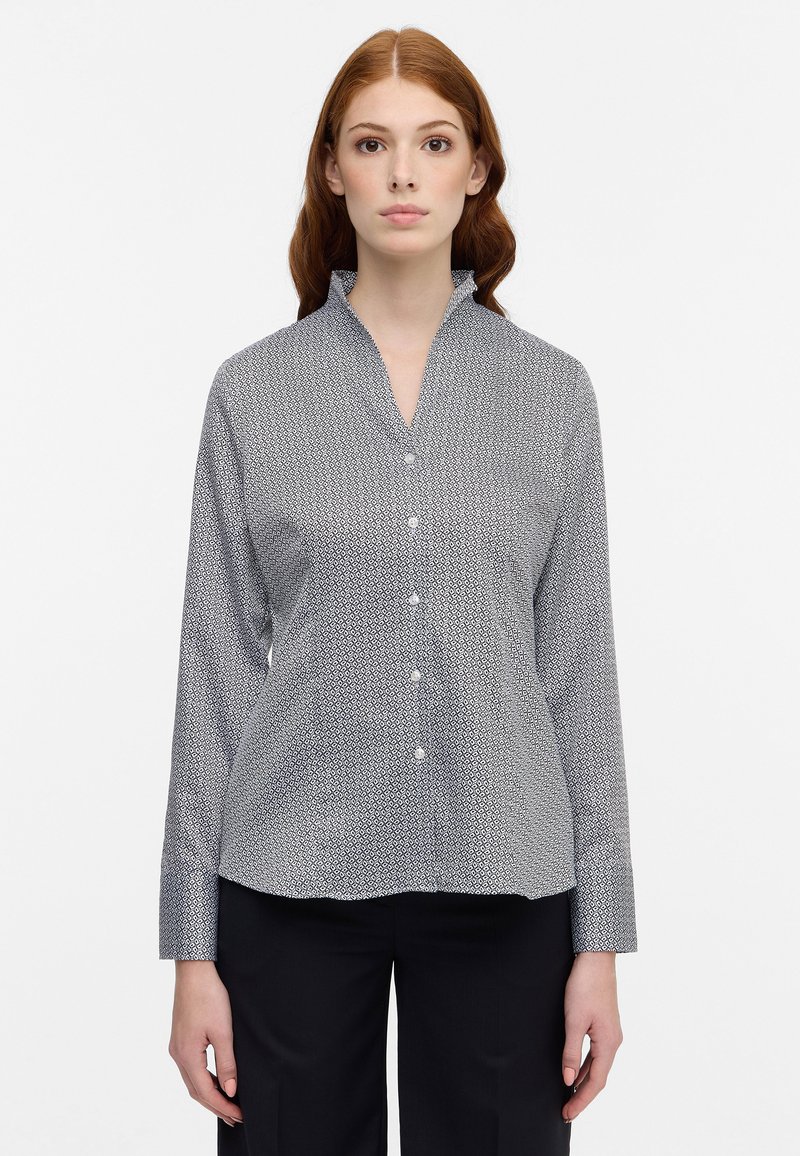 Long-sleeve button-up shirt in dark blue with a geometric pattern, featuring a mandarin collar and smooth fabric texture.
