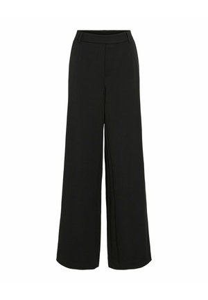 Pantalons larges noirs à taille haute, en tissu lisse, avec poches latérales, présentant un design épuré et minimaliste.