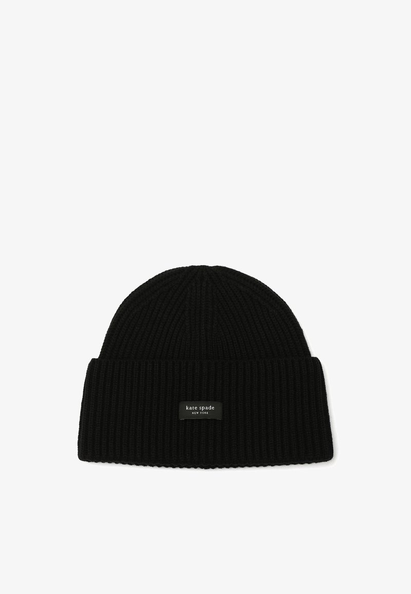 Black ribbed knit beanie featuring a folded cuff and a rectangular black leather logo patch with white text. Soft, warm texture.