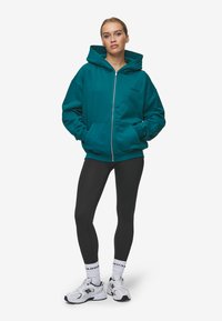 Pegador RAMIRA OVERSIZED - Felpa con zip - washed urban turquoise,black
