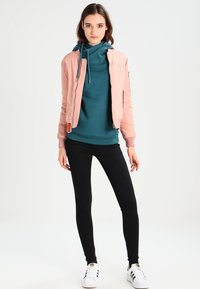 Urban Classics RAGLAN HIGH NECK  - Jersey con capucha - teal