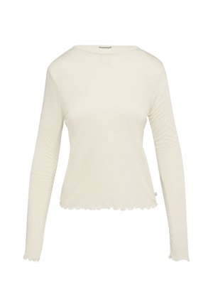 Lange mouw top van lichtgewicht stof, gebroken witte kleur, met een ronde halslijn en een gekartelde zoom.