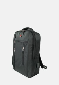 Black backpack made of durable fabric with two front zippered pockets, padded shoulder straps, and a top handle for easy carrying.