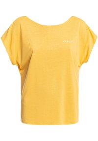 Keltainen lyhythihainen toppi pehmeästä, kevyestä kankaasta, jossa on löysä istuvuus. Sisältää leveän pääntien ja pienen valkoisen logon edessä.