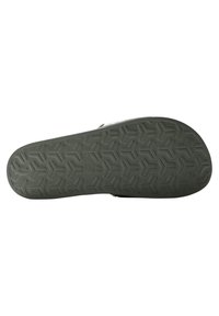 Sole di sandalo in gomma, superficie texturizzata con motivo a rilievo geometrico, colore grigio predominante, con tacco arrotondato e leggera curvatura.