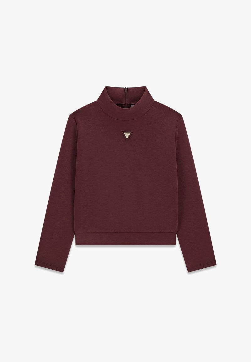 Top bordeaux à manches longues et col montant avec un petit patch logo triangulaire centré sous l'encolure et une fermeture éclair au dos.
