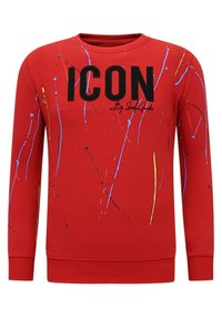 Rode sweatshirt met zwarte "ICON" tekst, gespatterd verfontwerp in blauw, geel en zwart, met ribgebreide manchetten en halslijn, reguliere pasvorm.