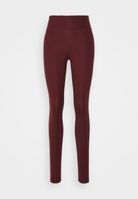 Burgundy high-waisted leggings made of stretchy fabric, featuring a smooth texture and a form-fitting design, suitable for active wear.
