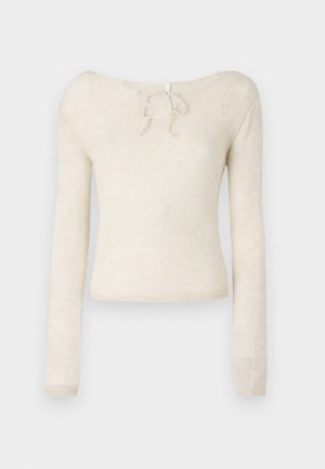 Lichtbeige langemouwen trui, met een rondhals en een strikdetail, gemaakt van zachte, gestructureerde breiwerk.