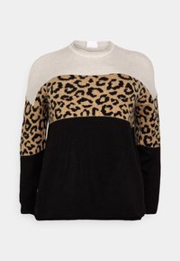 Pull avec le haut beige, le milieu et les manches imprimés léopard, et la partie inférieure noire unie, doté d'un col rond et de manches longues.