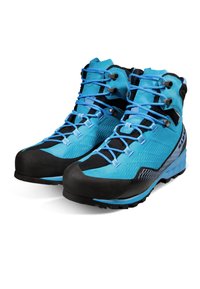 Bottes de randonnée bleues et noires avec des surfaces texturées, un système de laçage prononcé et un capuchon en caoutchouc. Présentent des semelles robustes pour une meilleure traction.