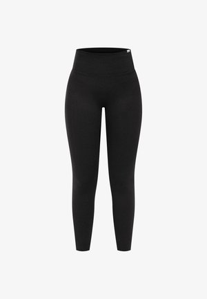 Leggings noirs en tissu extensible. Taille haute pour plus de confort. Texture lisse avec un design longue longueur et sans coutures visibles.
