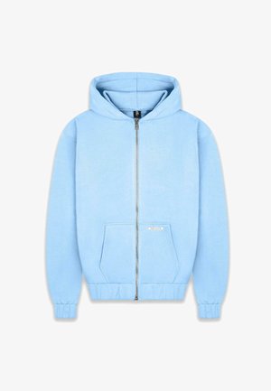 Light blue zip-up hoodie made of soft fabric, featuring a hood, front pockets, and ribbed cuffs and hem. Label on the side pocket.