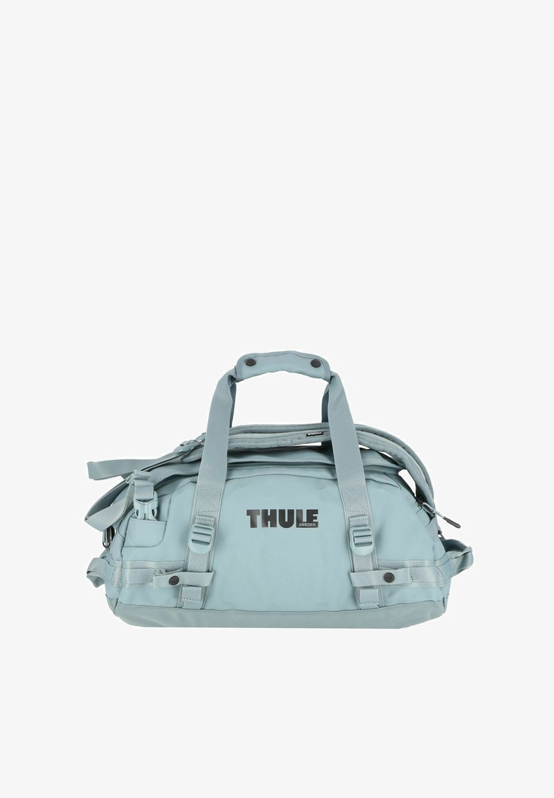 Borsa da viaggio azzurra chiara con doppie maniglie, tracolla regolabile, numerose tasche e logo Thule. Realizzata in materiale durevole e resistente all'acqua.
